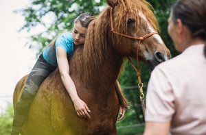 Therapie mit Pferd